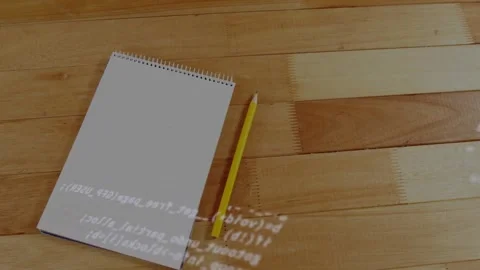 Code overlay appearing top-left and scrolling over pad, pad and pencil staying Stock Footage 329946736