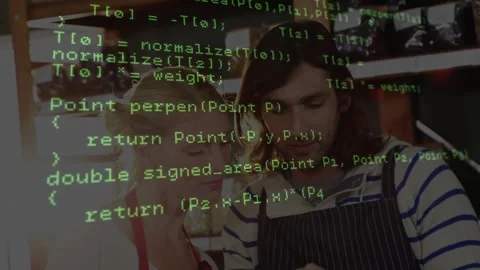 Code overlay fading in, colleagues leaning over tablet at counter, exploring Stock-Footage 319872029