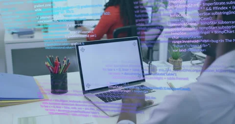 Code overlay intensifying across office desks and developer responding by typing Stock Footage 315563497