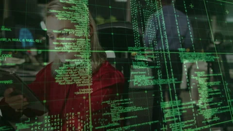 Code overlay parting while female office worker lifting tablet scrolling tech Stock Footage 314709018