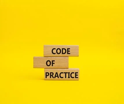Code of Practice symbol. Concept word Code of Practice on wooden blocks. Be.. 库存照片