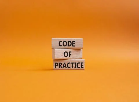 Code of Practice symbol. Concept word Code of Practice on wooden blocks. Be.. Stock Photos