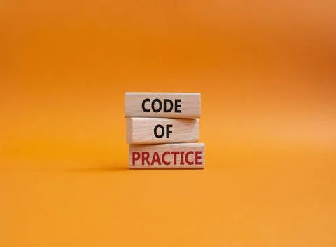 Code of Practice symbol. Concept word Code of Practice on wooden blocks. Be.. Stockfoto's