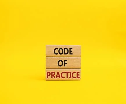 Code of Practice symbol. Concept word Code of Practice on wooden blocks. Be.. Stockfoto's