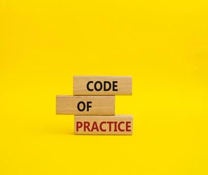 Code of Practice symbol. Concept word Code of Practice on wooden blocks. Be.. Stockfoto's
