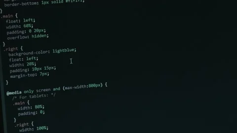 Code Programming Screen with Different Colours being Navigated by Stock Footage 217354035