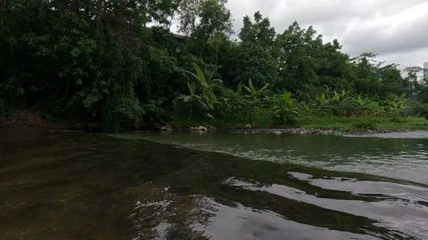 Code River — Dirty River in Yogyakarta, Indonesia Stock-Footage 320613007