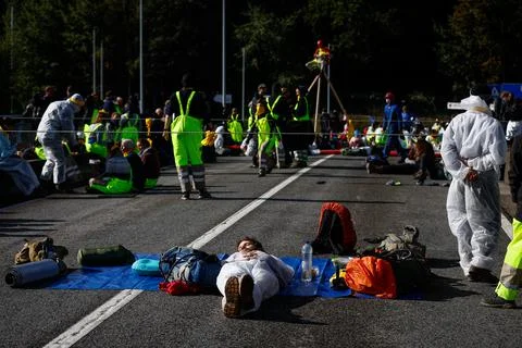 Code Rouge climate activists block access to TotalEnergies site in Feluy, Belgiu Stock-Fotos