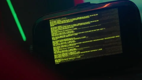 Code running on a screen in a dark place Stock Footage 231129653
