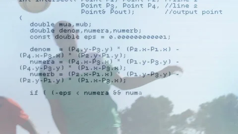 Code scrolling revealing soccer players dribbling and tackling on pitch for Stock Footage 316339420