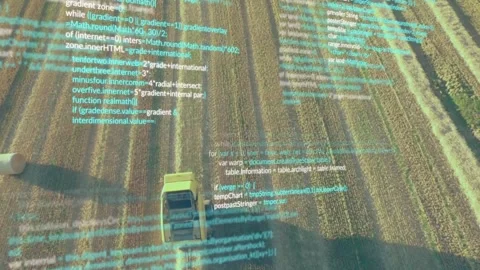 Code snippets floating initiating overlay as harvester moving through rows Stock Footage 318115529