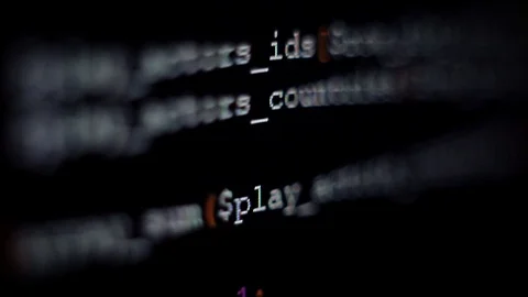 Code symbols on the computer screen, blur, dynamic focus. Programming language Stock Footage 118507253