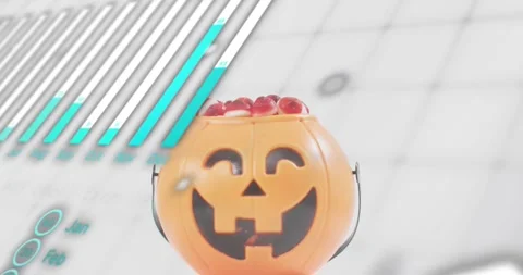 Code text scrolling sparking bar chart growing near pumpkin bucket with candies Stock Footage 317772790