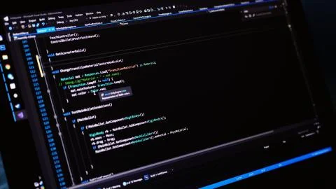 The code of the website on the computer monitor. The programmer at work. Stock Photos