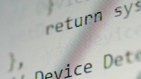 A code on a white screen, close up. Stock Footage 93017418