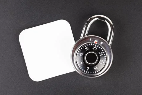 Coded padlock and a blank empty square image logo placeholder, top view Stock Photos