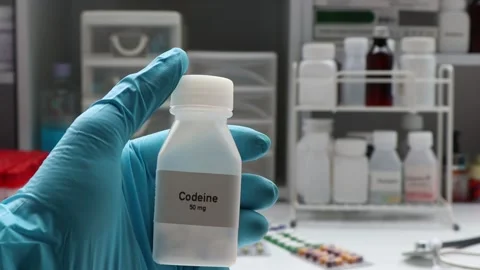 Codeine pill in white bottle Stock Footage 237905548