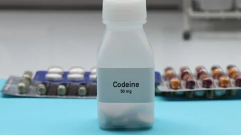 Codeine pill in white bottle Stock Footage 237905745