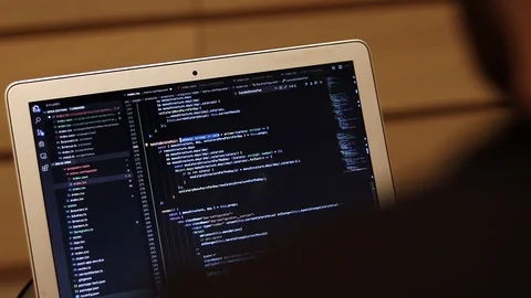 Coder developing program on laptop close-up. Real code on computer screen Stock Footage 121581824