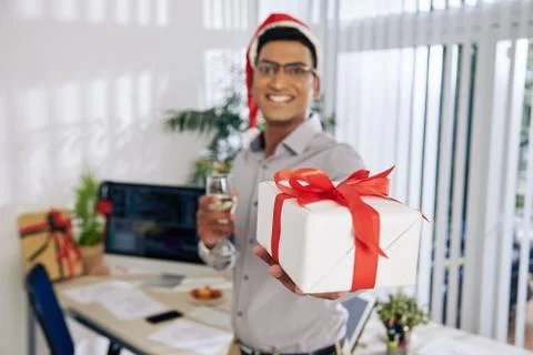 Coder giving Christmas present Foto stock