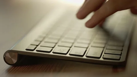 A coder hands are typing on pc keyboard. Businessman is working in office Stock Footage 178465611