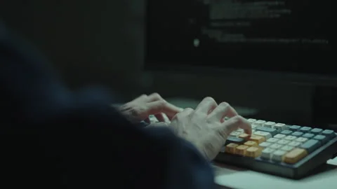 Coder hands rapidly typing on mechanical computer keyboard, programmer coding Stock Footage 321685560