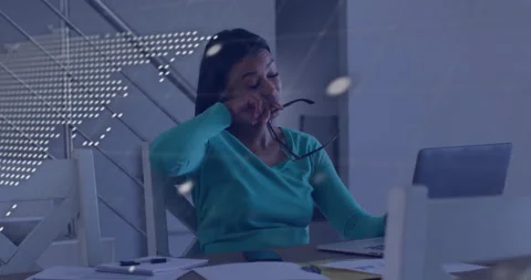 Coder leaning studying laptop as code and world map emerging while massaging Stock Footage 312017752