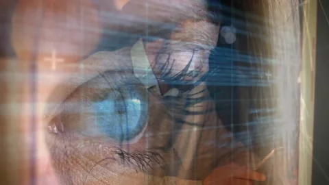 Coder opening eye initiating typing overlay revealing code streams for focused Stock Footage 329980274