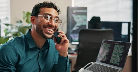 Coder, phone call and happy man with laptop screen in office, project update or Stock Footage 346948667