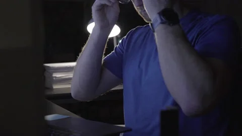 Coder Putting on Glasses to Type Stock Footage 208745758