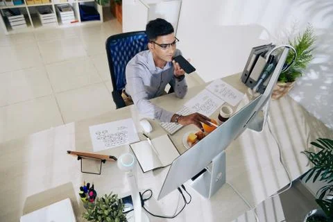 Coder recording voice message 스톡 사진