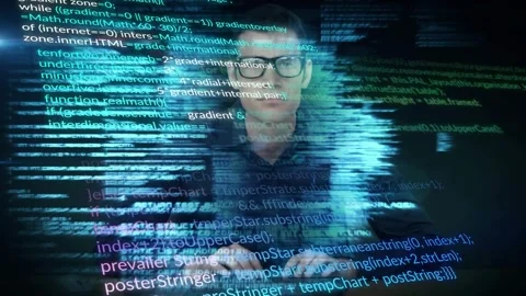 Coder typing keyboard, generating colored code overlays reflecting on glasses, 库存影片 329869385
