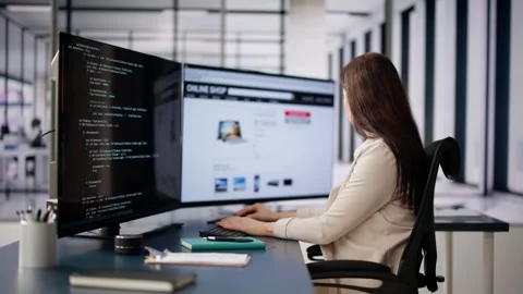 Coder Using Computer At Desk Stock Footage 267294662