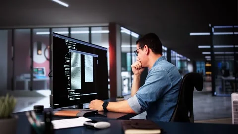 Coder Using Computer At Desk Stock Footage 285193219