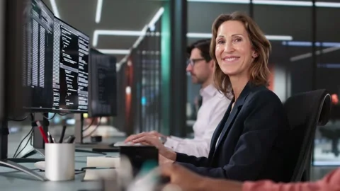 Coder Using Computer At Desk Stock Footage 301822841