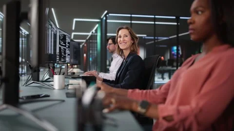 Coder Using Computer At Desk Stock Footage 303656989