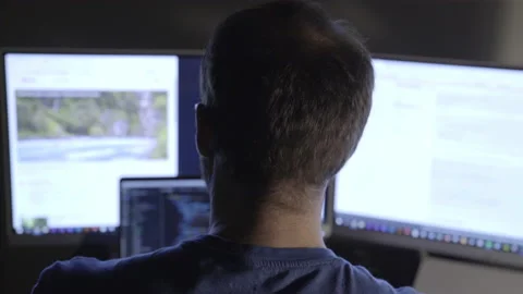 Coder Using Multiple Devices Stock Footage 208746237