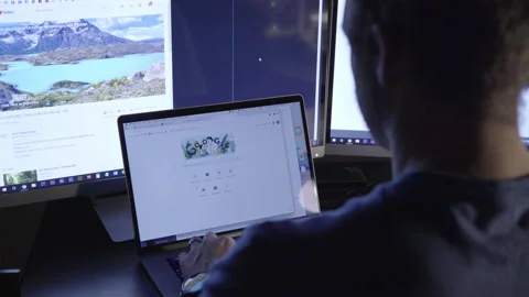 Coder Working on Multiple Devices Stock Footage 208746147