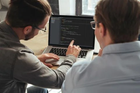 Coders colleagues working on new project together Stock-Fotos