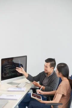 Coders discussing project Stock Photos