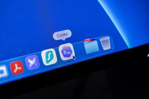 Codex software icon on a desktop dock, highlighting programming tools and 写真素材