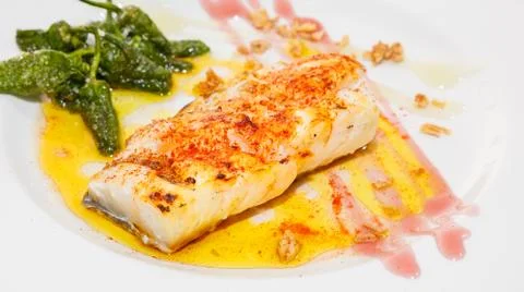 Codfish with peppers Stock Photos