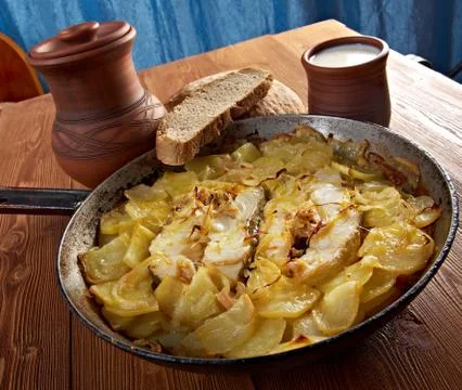 Codfish with potatoes Фото