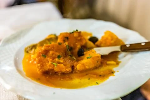 Codfish In tomato sauce Stock Photos