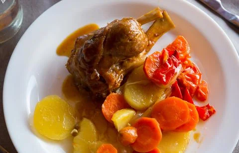 Codillo with baked potatoes Photos