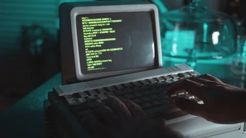 Coding on a 80s computer Stock Footage 119131341