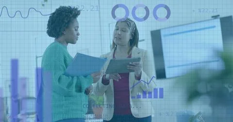 Coding and data processing on interface over diverse female colleagues Stock Photos