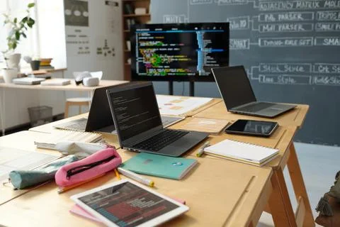 Coding and Developing in Modern Tech Office Stock Photos