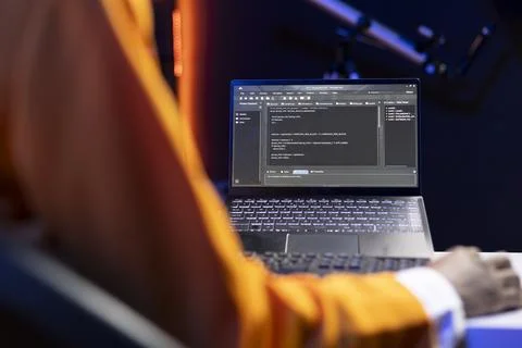 Coding application UI on laptop used by IT developer writing and testing code Stock Photos