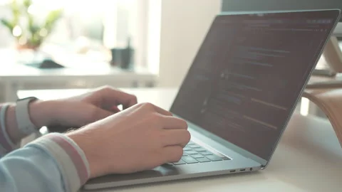 Coding. businessman type on laptop keyboard. Touch typing pointing cloud data 動画素材 134963870